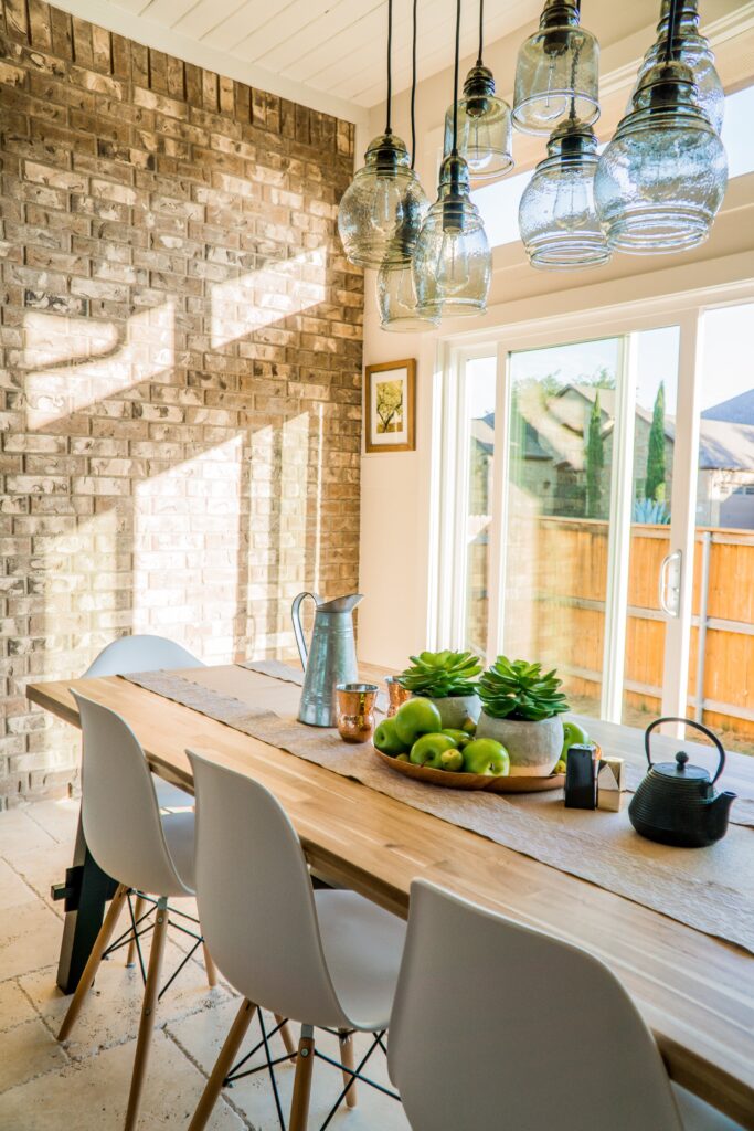 dining room with pendant lights above the table

staging design